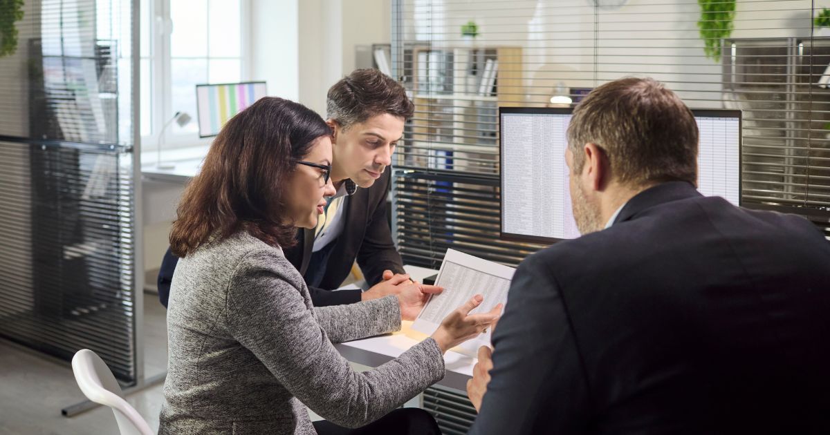 Business owner reviewing ways to increase the value of their business before selling with an adviser