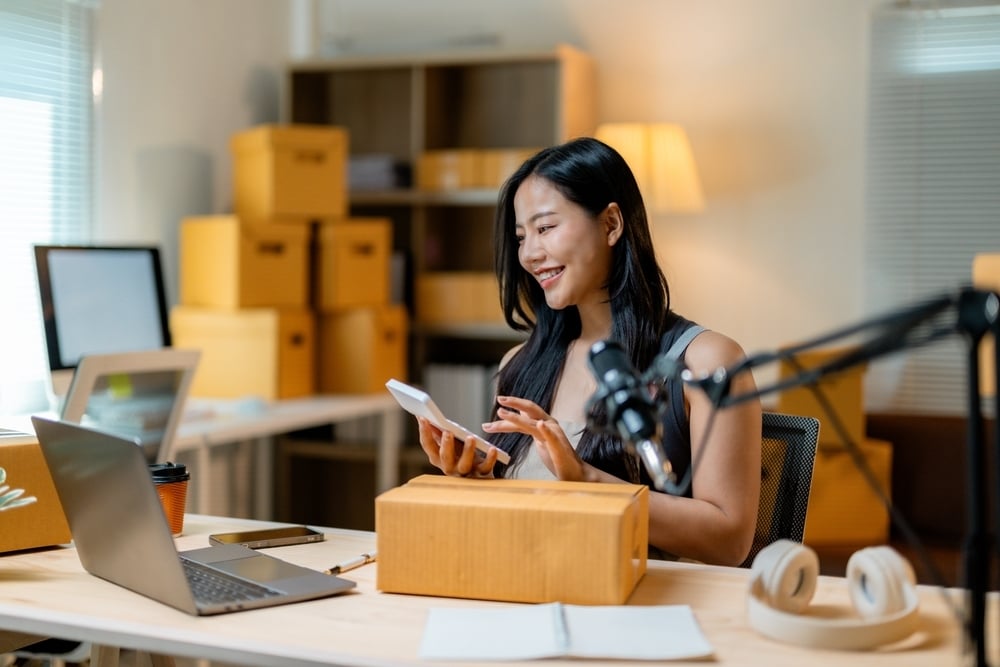 social media influencer managing bookkeeping calculations