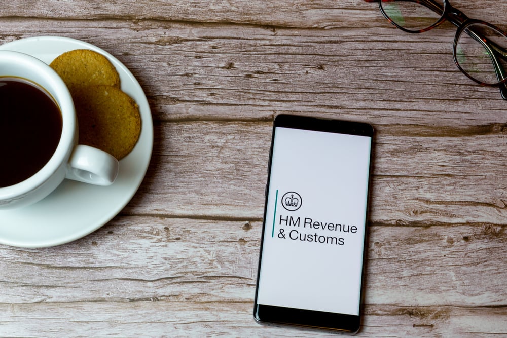 HMRC on mobile phone on a table